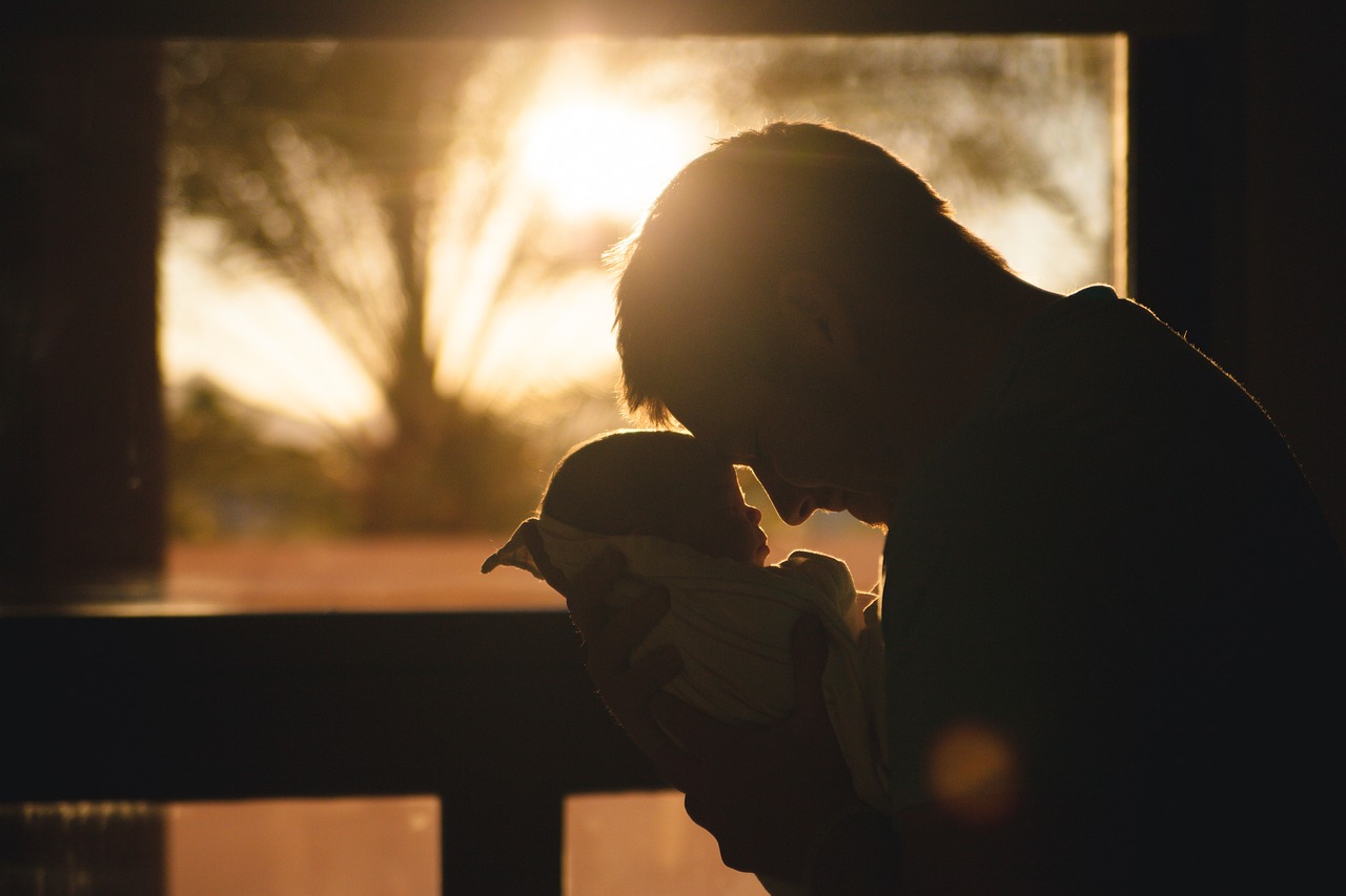Father holding child
